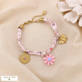 Floral fabric steel bracelet with charms knotted 0225054: Pink
