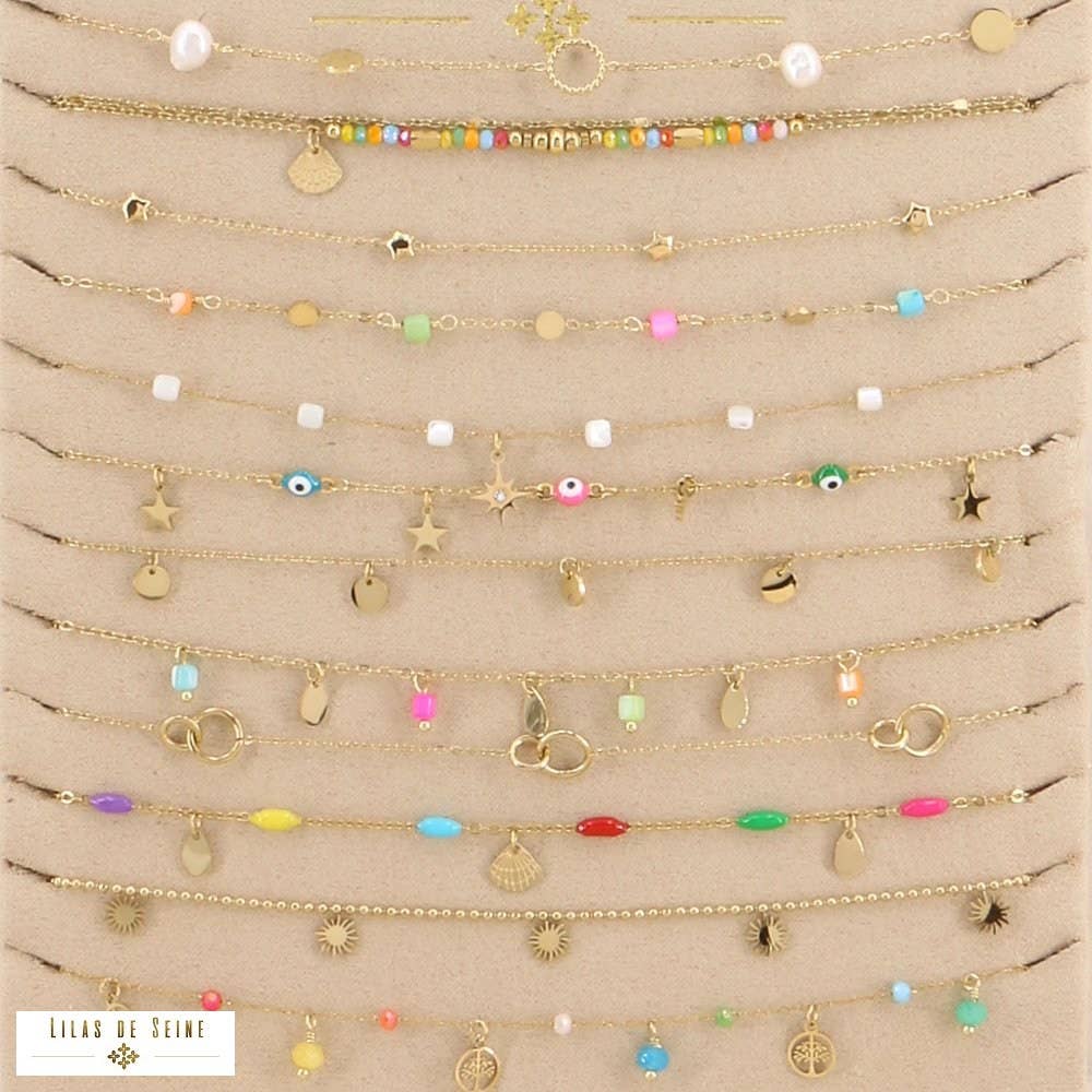 Display of 12 shell steel anklets 0223179: Multi